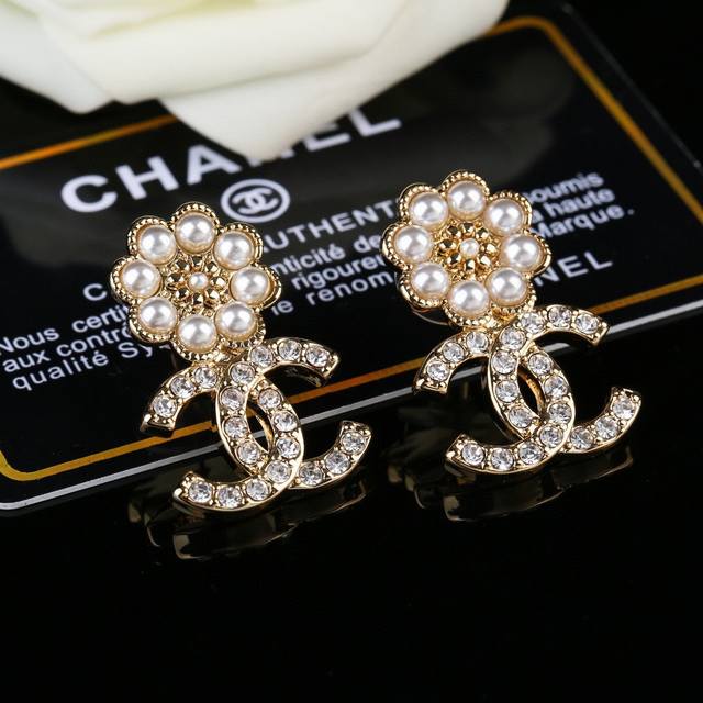 Chanel's new pearl earrings are now available at the store. Double C earrings a