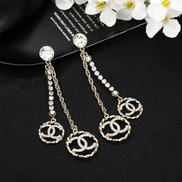 Chanel's new earrings are now available at the Chanel store. Double C hoop earr