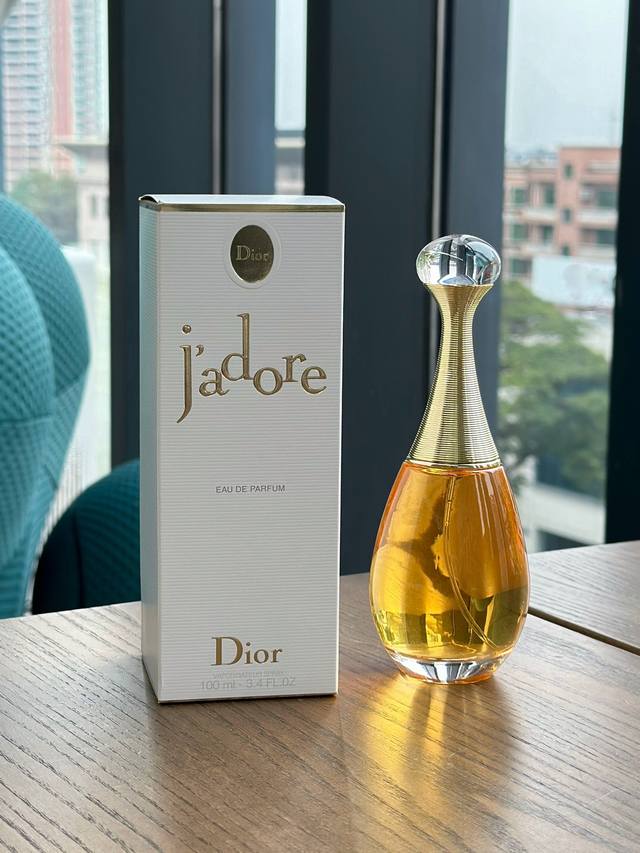 Original quality DDD. Dior J'adore perfume, with its slender neck and shimmering