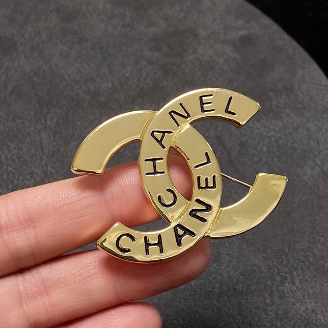 Chanel's newest collection arrives at the Chanel boutique. This antique gold-fin