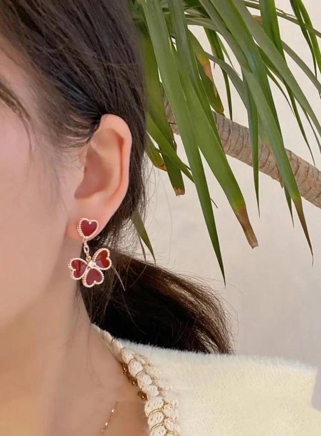Van Cleef & Arpels Vca Sweet Alhambra four-leaf petal earrings, made entirely o