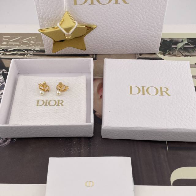 We're showcasing the Dior CD Star Diamond Drop Bead Earrings Z 3400. They're so