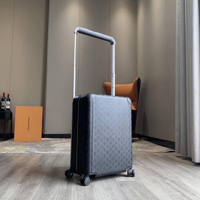 This Horizon 55 trolley case, embossed with the iconic Monogram pattern in Tauri