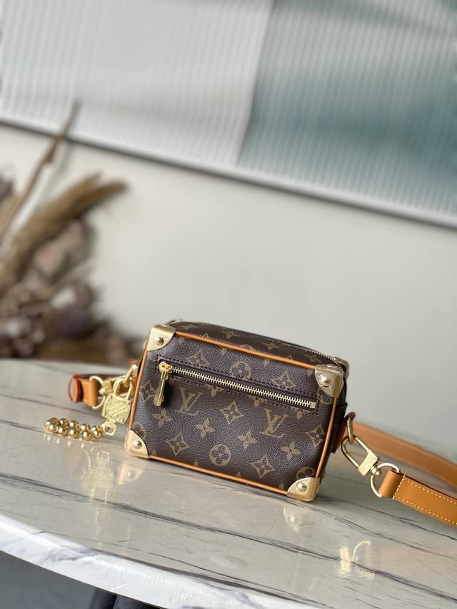 Steel hardware, top-grade original M14729. This Mini Soft Trunk bag features Mon