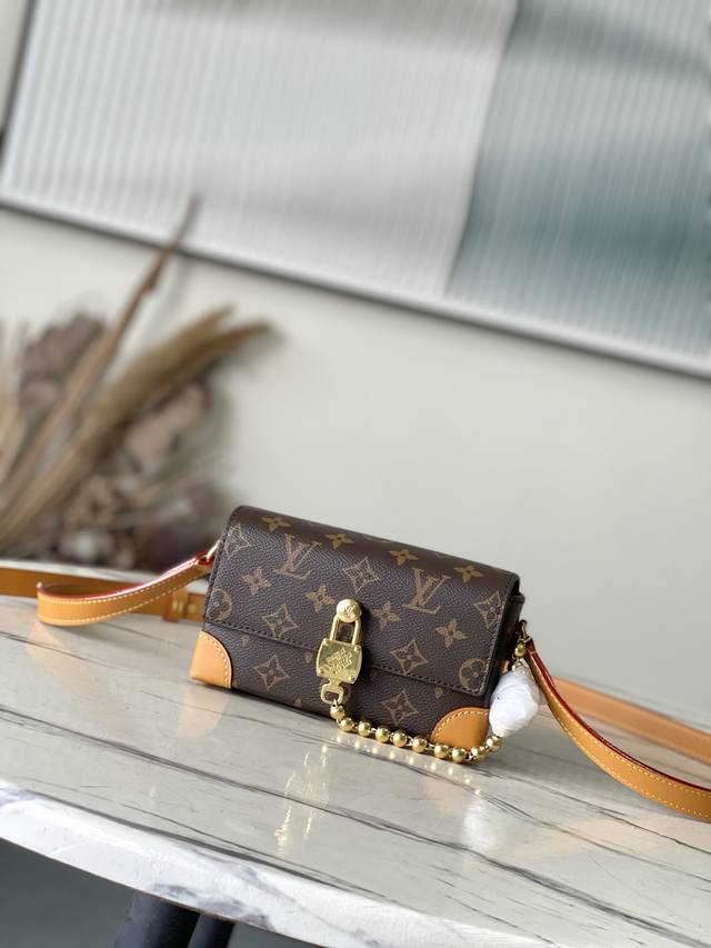 Top Original M14738 This Steamer mini bag is crafted from Monogram canvas with