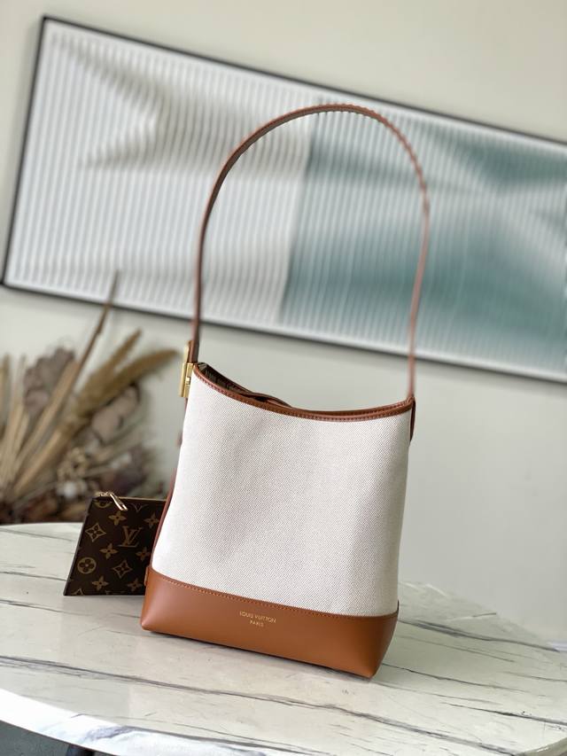 Top-grade original M25468 This Lowkey Hobo small handbag combines canvas and co
