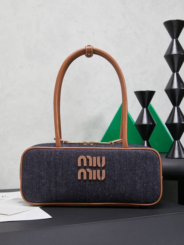 5Bb173: Denim blue with brown leather, Miu's new bowling ball, the latest two-to