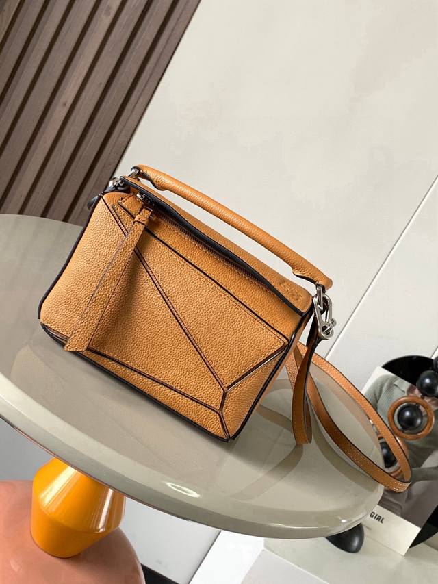 The popular geometric bag, the mini 18cm Puzzle handbag in genuine imported nap
