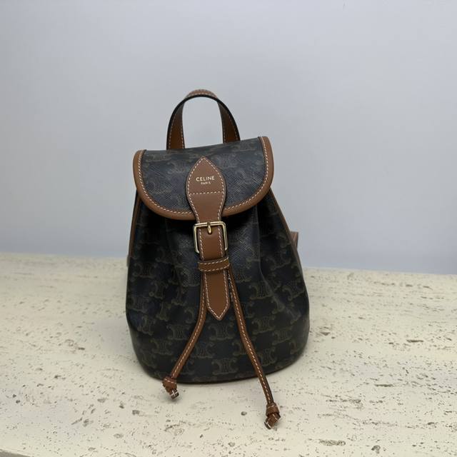 Folco Triomphe Canvas logo print and cowhide leather mini backpack 7 x 8 x 4 inc