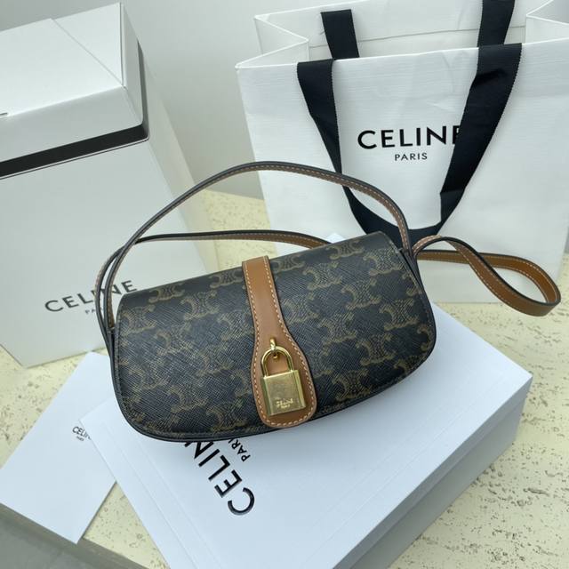 Tabou logo print canvas with calfskin strap clutch Tan 7 x 3 x 2 inches (18 x 8