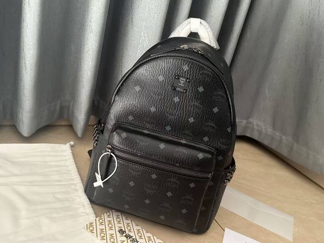Style: Mcm Original Small/Medium Stark Visetos Side Studded Backpack The iconic