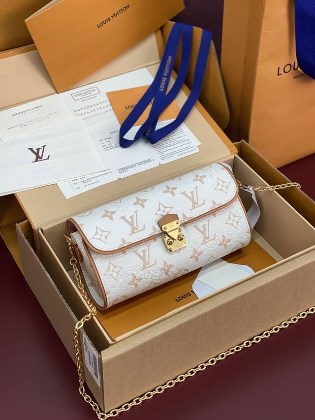 Upgraded version M26583 Chip version! This Pochette Camille handbag, clad in Mon