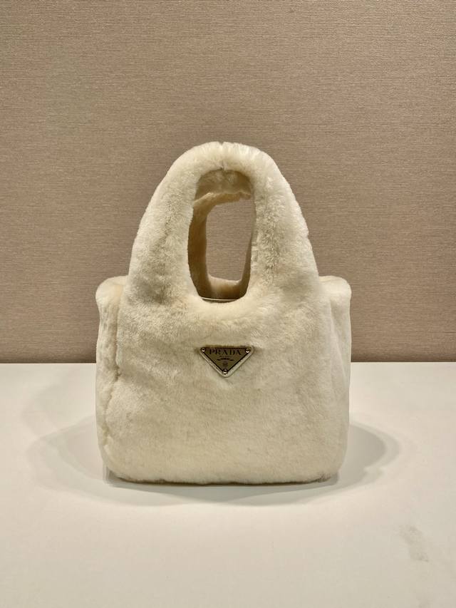 Comes with designer packaging. Wool Bucket Bag 1Ba349 DDD. This shearling handb