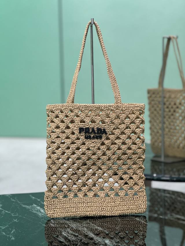 Straw Shopping Bag This crocheted triangle tote reinterprets the classic woven f