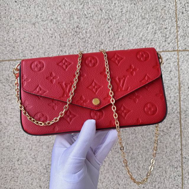 Top-grade original M63700 Red. Crafted from Monogram Empreinte canvas, the Poch