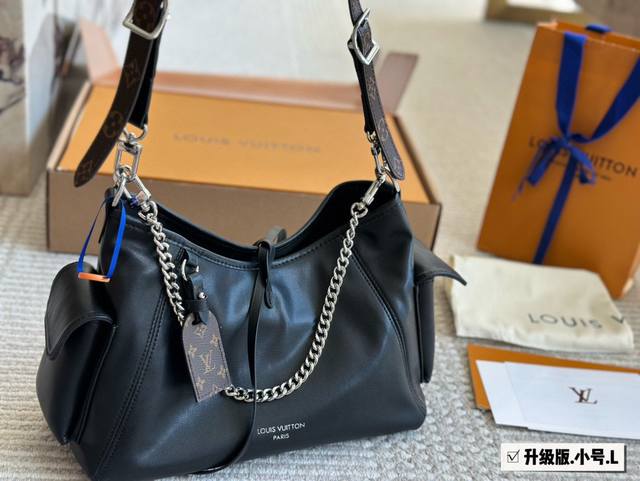 Cowhide Carryalldark Medium Handbag This Carrvall Dark Medium Handbag is crafte
