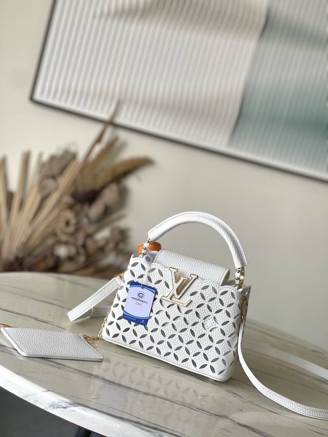 Premium Genuine Leather M25497 This Capucines mini handbag, featuring the Bloom