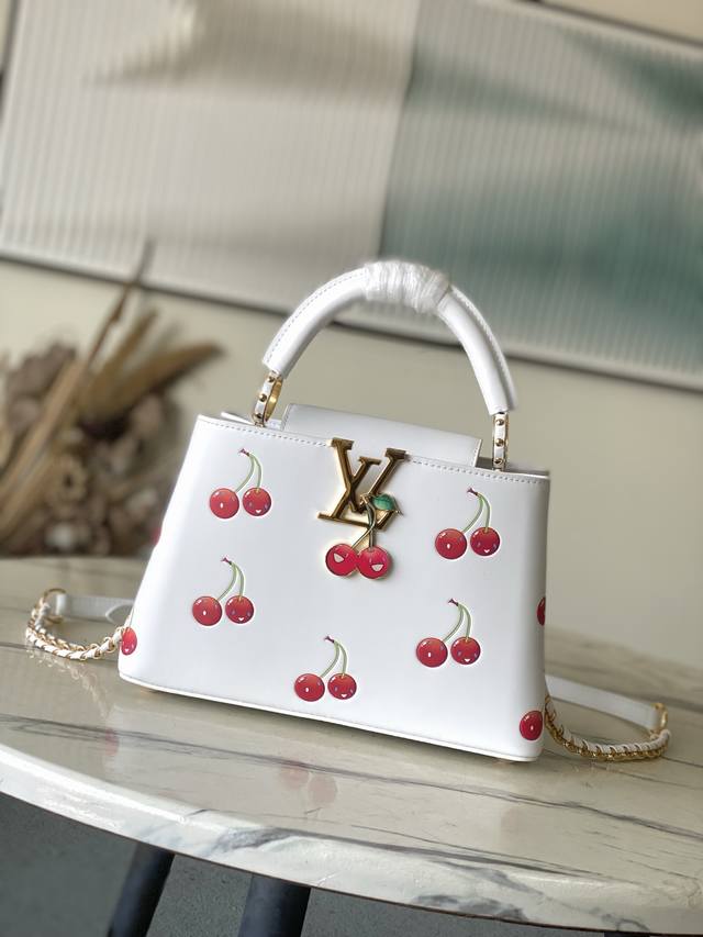 Premium Genuine Leather M13251 Small. This Capucines Small bag embodies the Lou