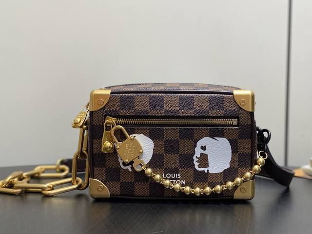 Original boutique N40809 Mini Soft Trunk Chain Bag with a silk-screened portrai