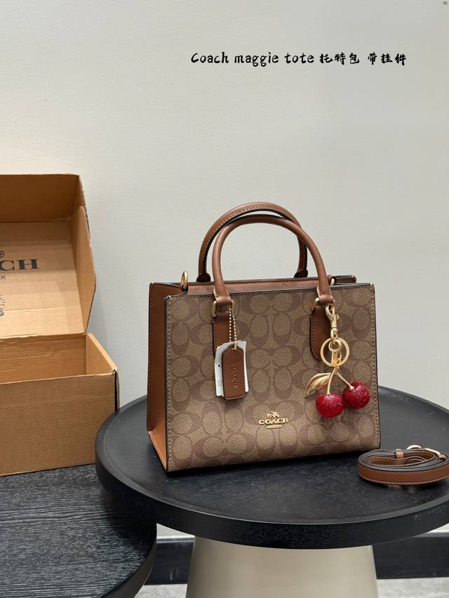 Comes with box. Upgraded with cherry pendant. Coach Maggie Tote. New Spring/Sum