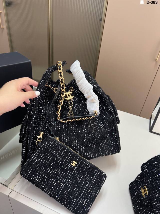 Big Chanel Chanel 25A woolen sequin drawstring bucket hobo bag black tweed movin
