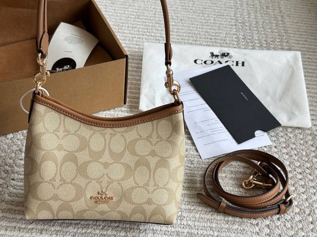 Coach I didn't expect the mini hobo bag to be this cute. The mini hobo bag is so