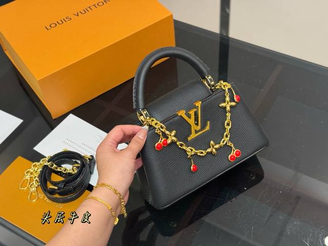 comes with a folding box. Size 21.15cm. Lv Capucines handbag. Made from full-gr