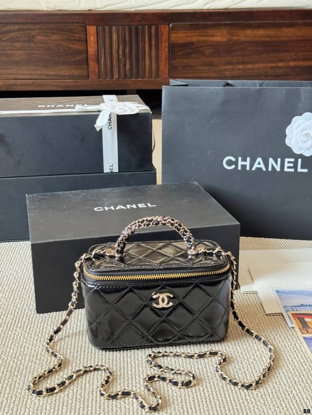Lambskin Chanel | 24B Box Bag DDD. Chanel's iconic black and gold colorway is f
