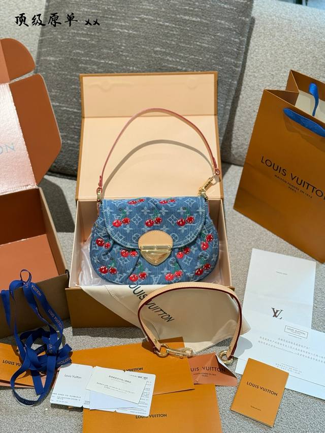 Lv X Murakami Takashi Sunset Who hasn't owned one? Last year's denim Sunset has