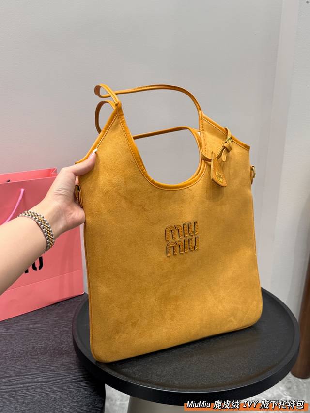 Size 35.30 Miumiu Suede Ivy Underarm Tote Bag This large shoulder bag has become
