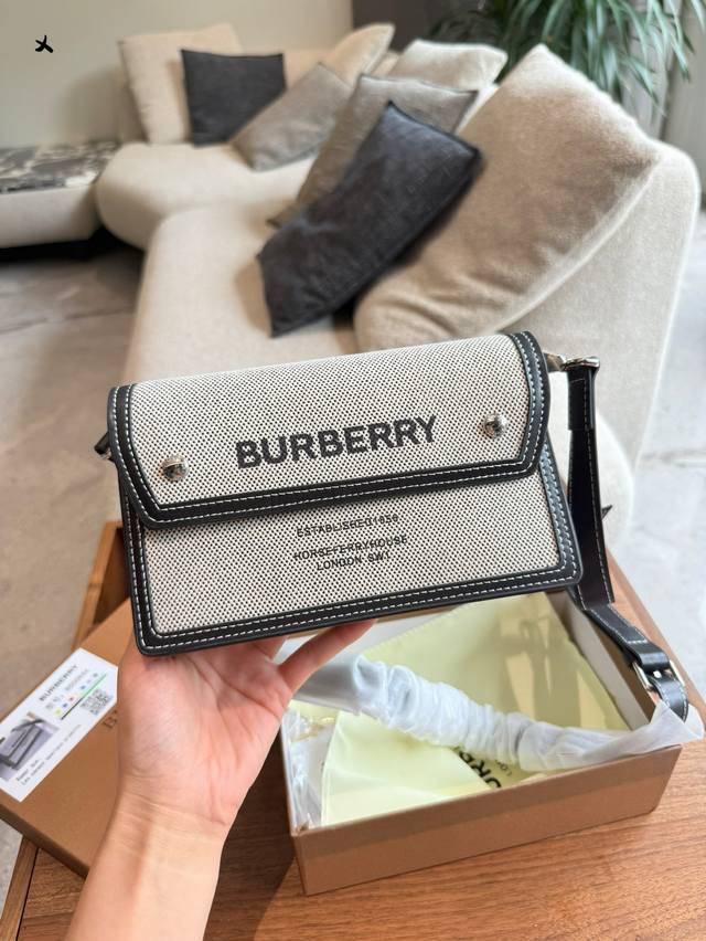 Black denim with a unique style Burberry messenger bag The combination of black