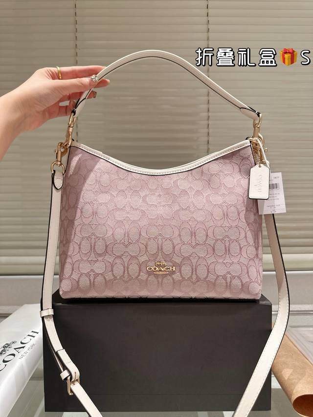 Coach Who understands the beauty of the new Laurel hobo bag The denim color is r