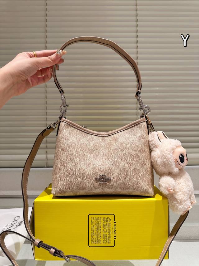 Cowhide version with pendant Coach