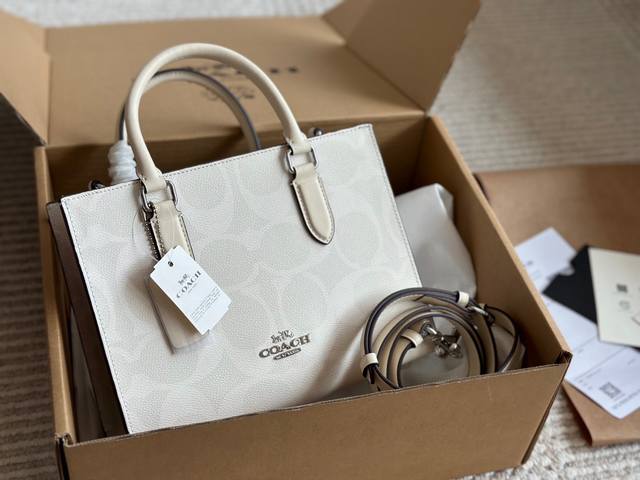 Coach Glacier White Maggie Tote is a versatile partner for refreshing streetwear
