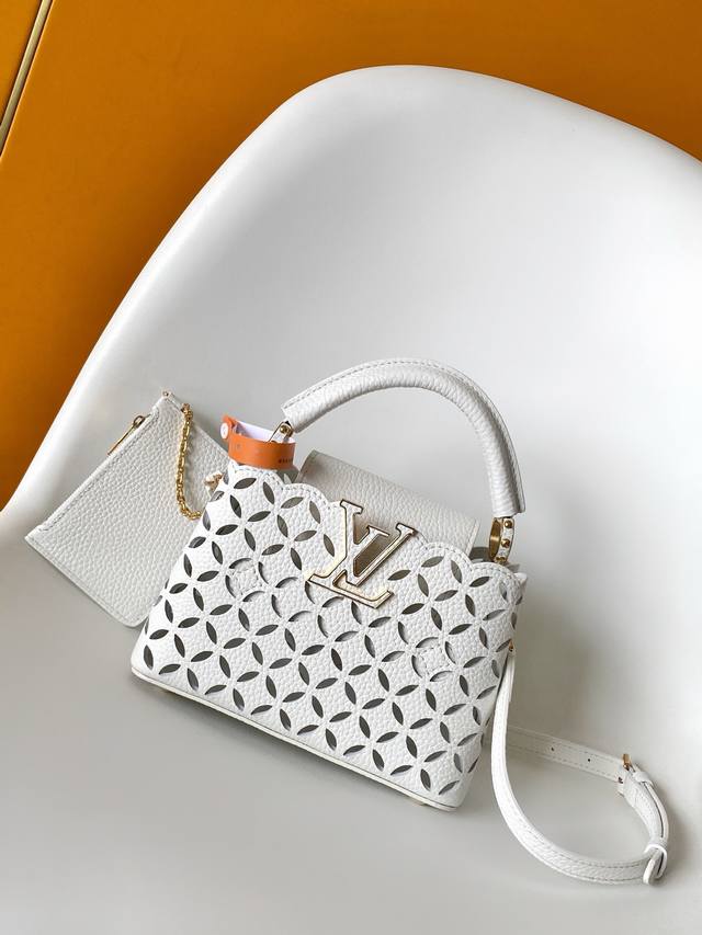 M25497 Premium Original Dynamic 163 This Capucines mini handbag, featuring a Blo