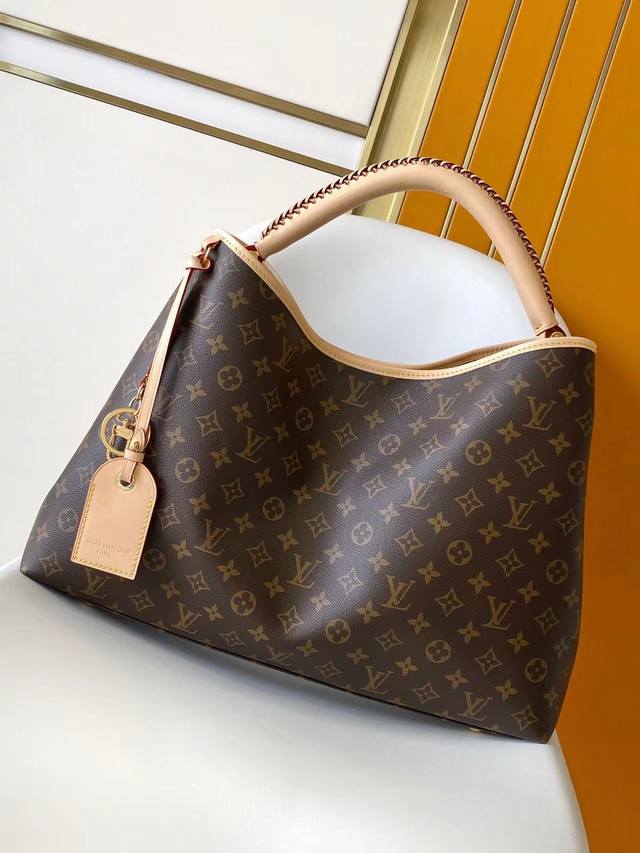Dynamic163Top Original SingleM25877 This Again bag is a modern, more versatile,
