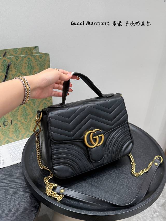 Gift box packaging. This Gucci Marmont messenger bag from the Black Samurai Marm