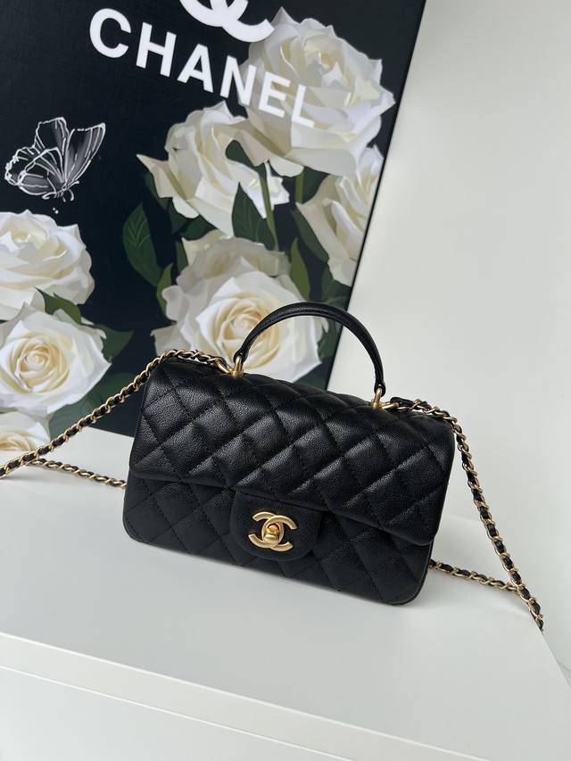 Chanel 21K's latest Mini Cf Handle Handbag As2431. The classic diamond-shaped fl