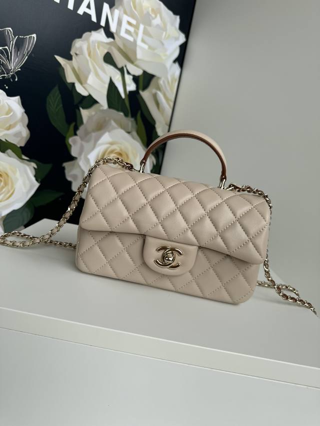Chanel 25 Early Spring's latest Mini Cf Handle Handbag As2431. The classic diamo