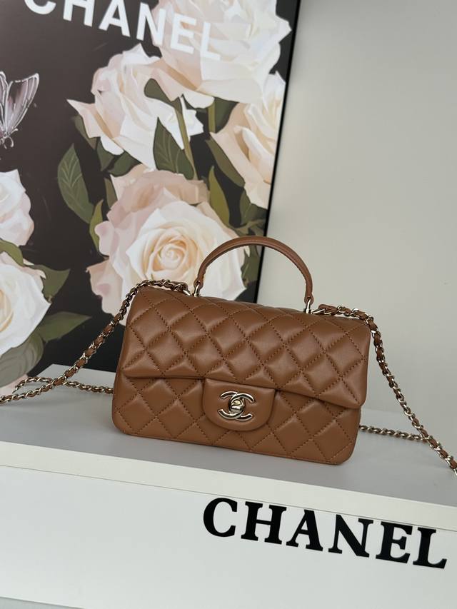 Chanel 25 Early Spring's latest Mini Cf Handle Handbag As2431. The classic diamo