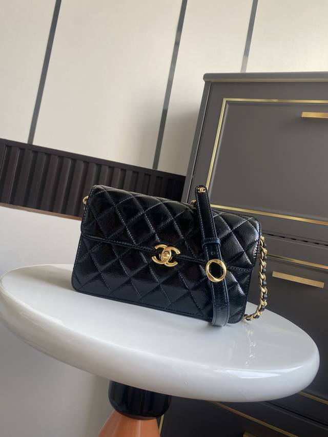 Medium Premium Series Waxed Leather Flap Bag. This unique black material has a v
