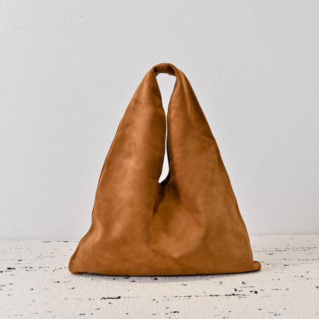 The Row Bindle Bag Large With its minimalist and elegant design, this bag contin