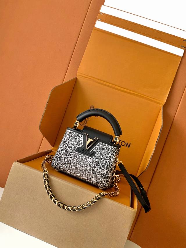 Premium all-steel hardware, featuring imported leather and hand-set crystal dia