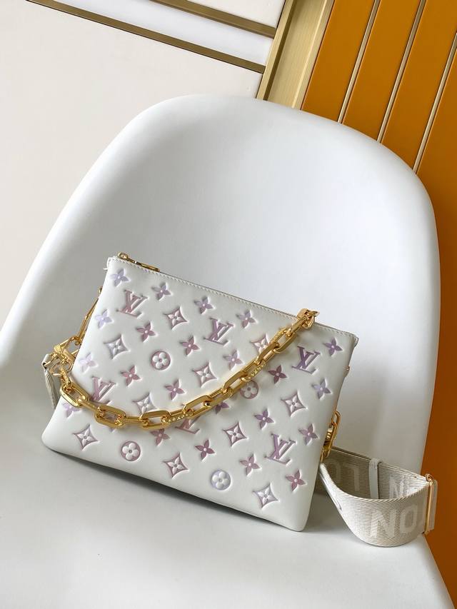M33160 Top-grain sheepskin, original, dynamic 163. This small Coussin handbag fr