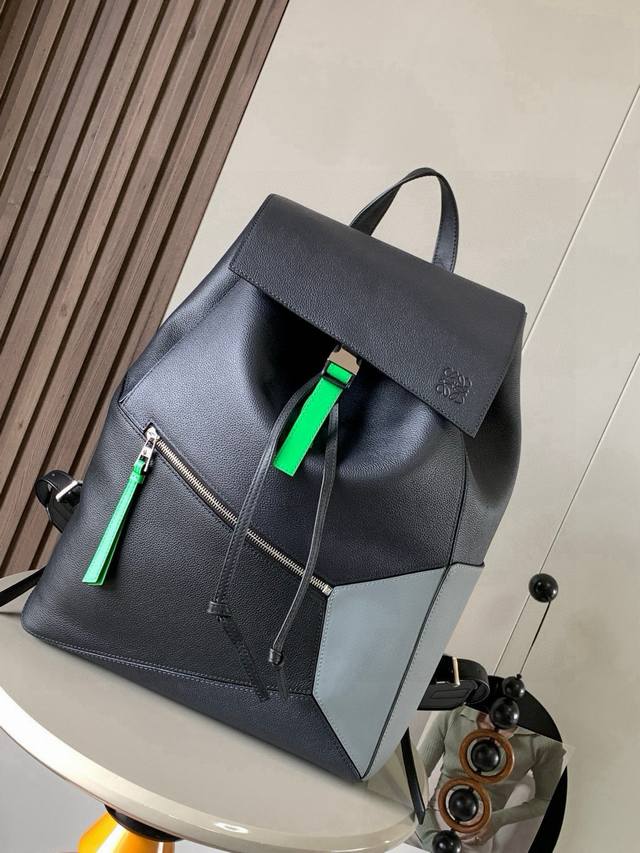 Original leather Puzzle Backpack. This soft grained cowhide military backpack is