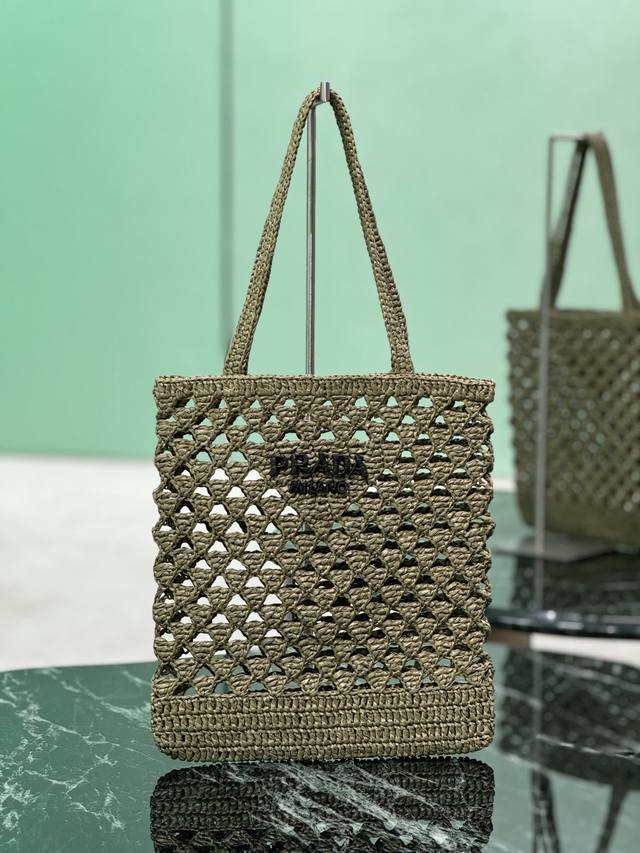 Authentic Straw Shopping Bag This crocheted triangle tote reinterprets the class
