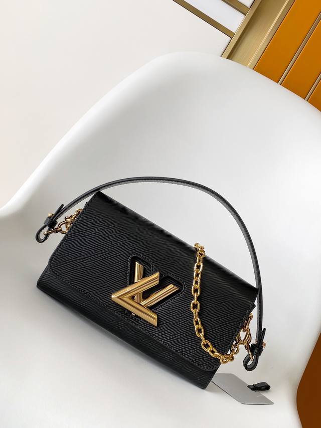 M25336 Black Samurai Twist West Handbag (M24549 Black, M24550 Off-White) The Twi