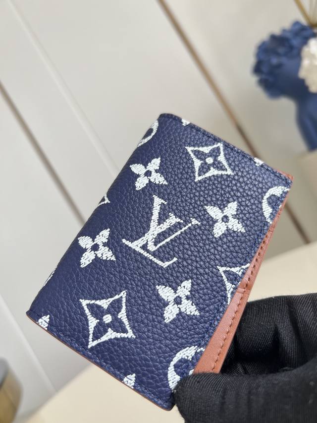 Factory Price: p. This Louis Vuitton pocket wallet, crafted from premium blue M