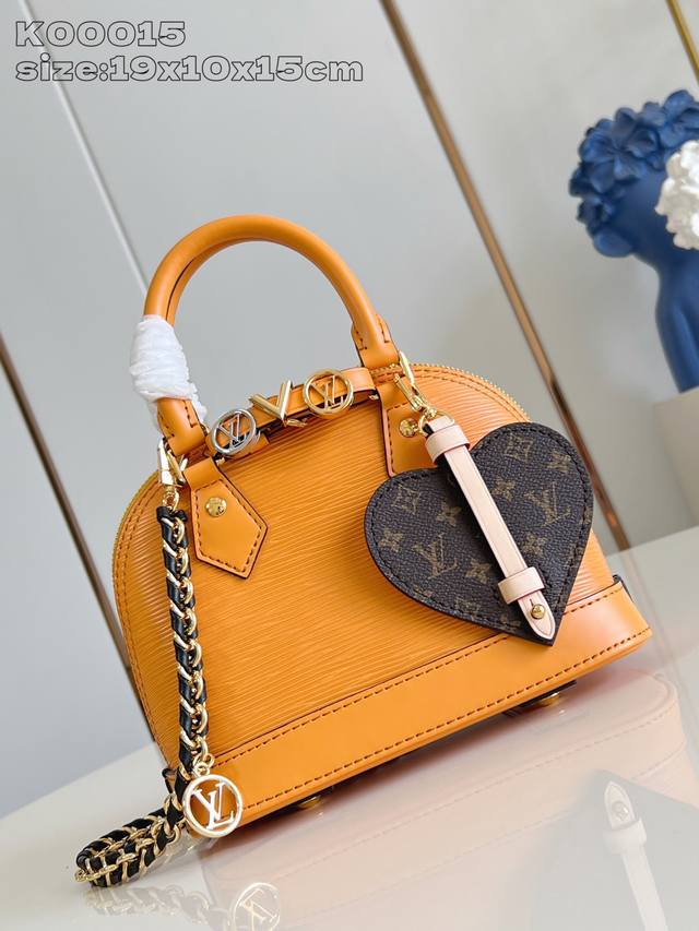 Factory Price: Premium Original K00015 Turmeric. This Alma Mini Bag from the Lv