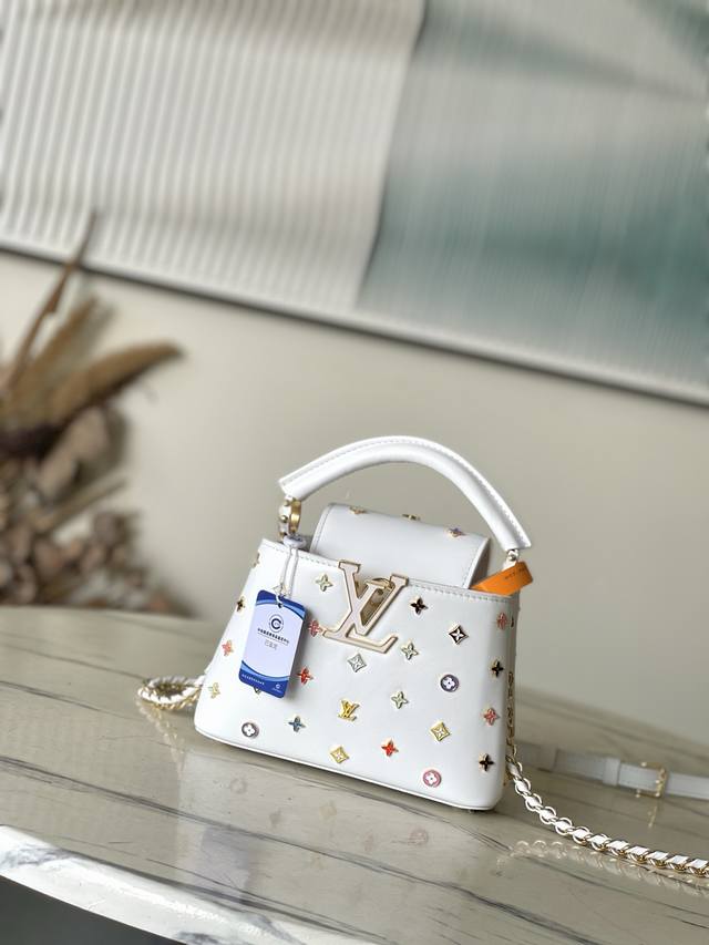 Factory Price: Premium Genuine Leather M14165 White. This Capucines handbag, pa